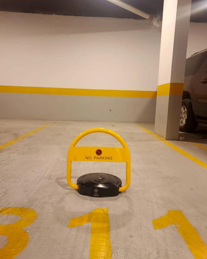 Electronic parking barrier protecting a numbered indoor garage space