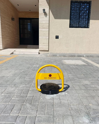 Electronic parking barrier installed in an outdoor private parking space
